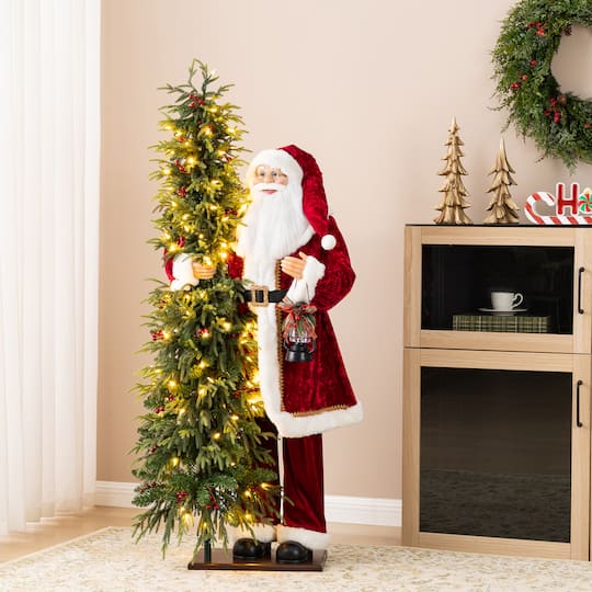 Glitzhome® 4ft. Oversized Traditional Christmas Santa with 5ft Lighted PE Dripping Christmas Tree